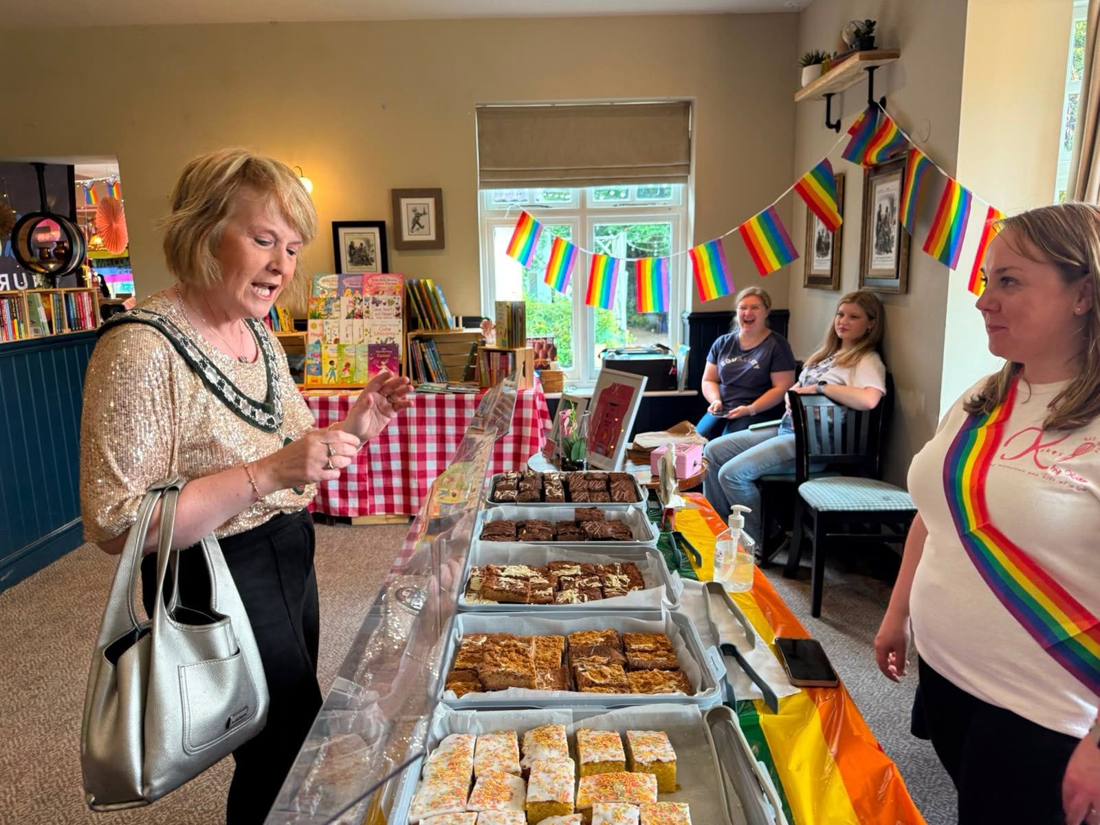 Chair Vivienne James at Bridgend Pride 2026 cake stall Grant funding for community groups